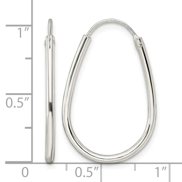 Two silver hoop earrings displayed next to a measurement ruler, one thin and closed, one larger and open teardrop-shaped with a hinge closure.