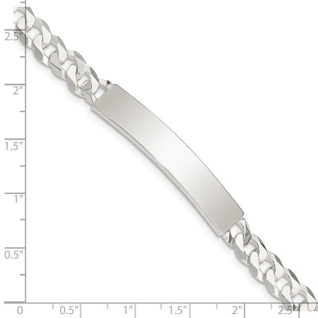 Silver curb chain bracelet with rectangular engravable plate, displayed against a ruler showing approximately 2.5 inches total length.