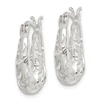 A pair of silver hoop earrings with ornate filigree detailing and a polished finish, displayed against a white background.