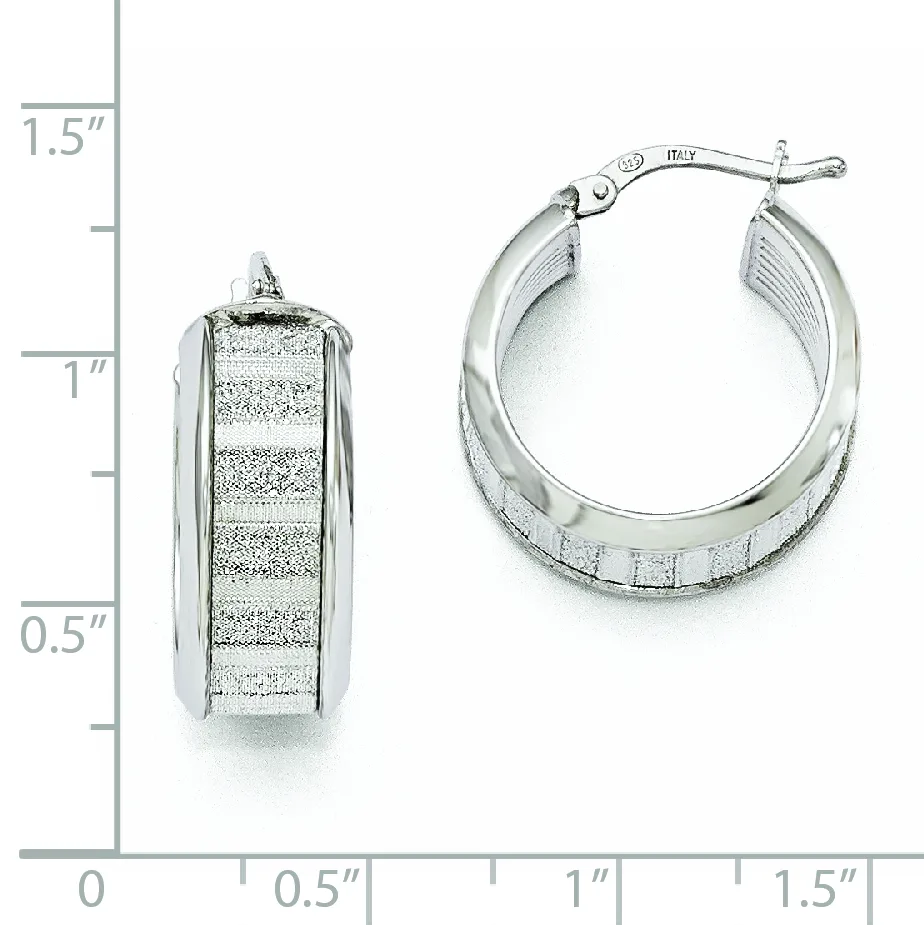 Silver hoop earrings with textured striped surface shown from front and side view next to a measurement scale.