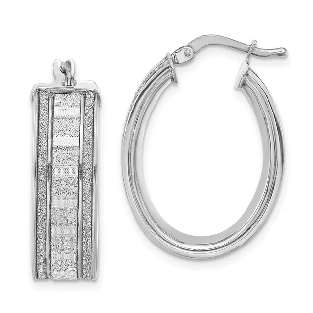 A pair of silver hoop earrings with textured finish and striped detail, shown from front and side views.