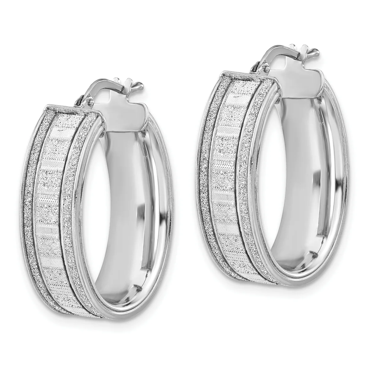 Pair of silver hoop earrings with textured glitter finish and polished smooth sides, shown from front and back angles.