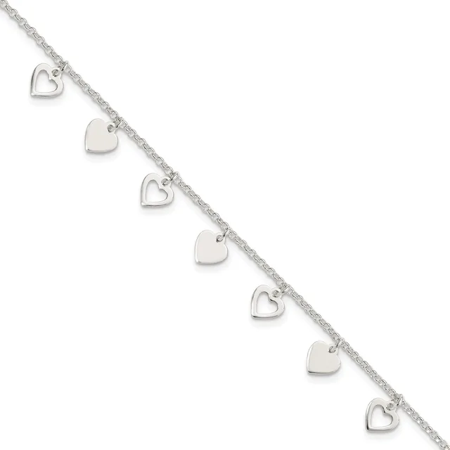 Silver bracelet with an alternating pattern of solid heart charms and open heart outlines hanging from a delicate chain.