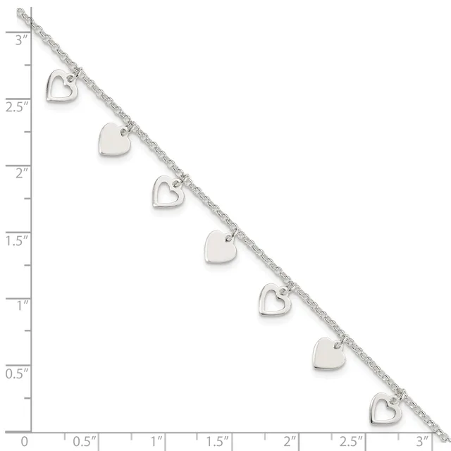 Silver bracelet with alternating solid and open heart charms displayed against a ruler showing 3 inches in length.