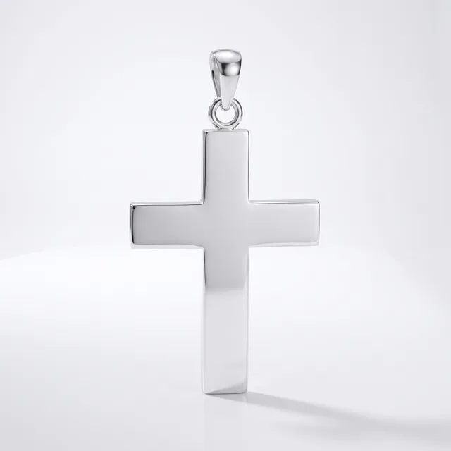 A polished silver cross pendant with a rectangular bail loop attached to the top, displayed against a white background.