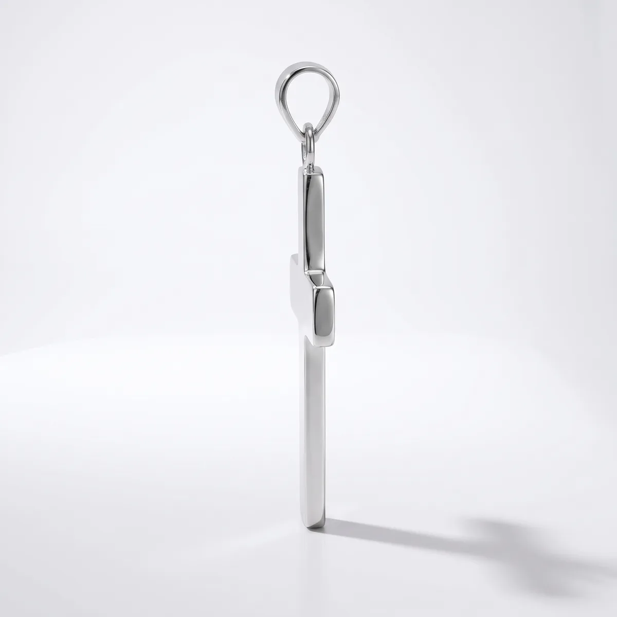 A stainless steel turnbuckle with a loop eye at the top and a hook-and-eye closure mechanism in the middle, displayed vertically against a white background.