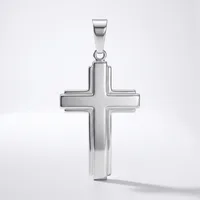 A polished silver cross pendant with a hollow center design and a bail loop at the top, displayed against a white background.