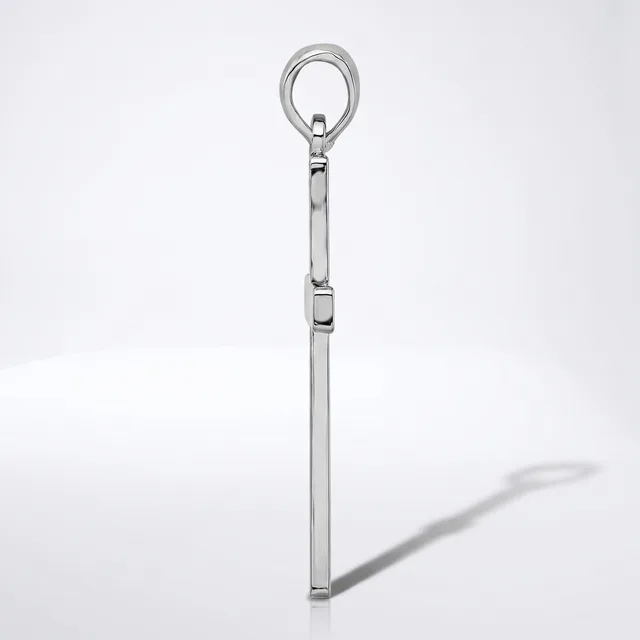 A polished metal eye bolt with a long shaft and threaded section, shown vertically against a white background with its shadow visible.