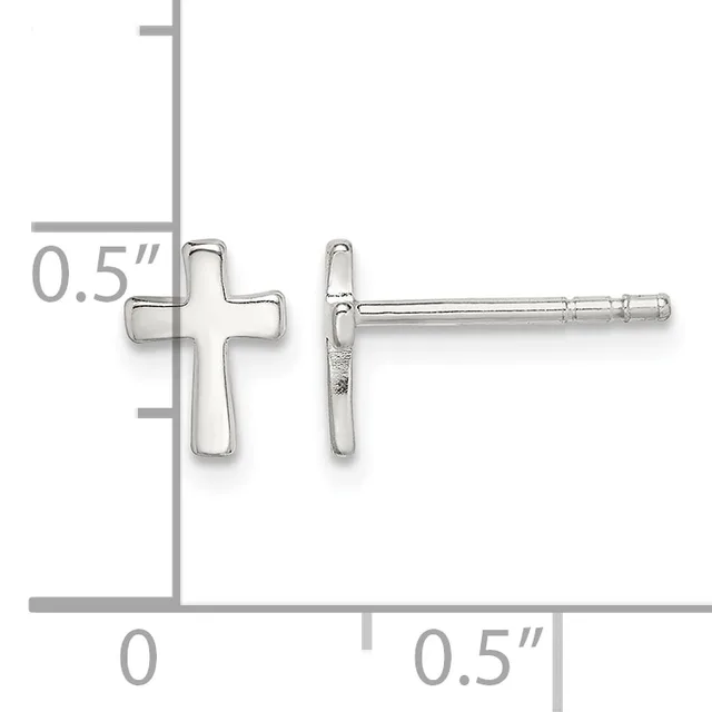 A pair of silver cross stud earrings shown front and side view, measuring approximately 0.5 inches tall, displayed on a measurement scale.