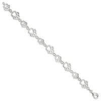 A silver bracelet with repeating heart-shaped links connected by decorative circular elements, displayed diagonally against a white background.