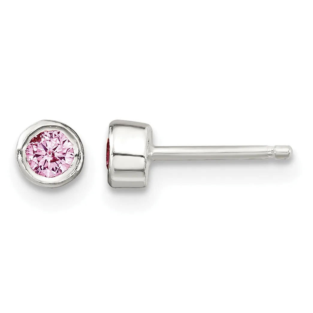 A pair of silver stud earrings with round bezels containing pink round-cut gemstones, shown from front and side views.
