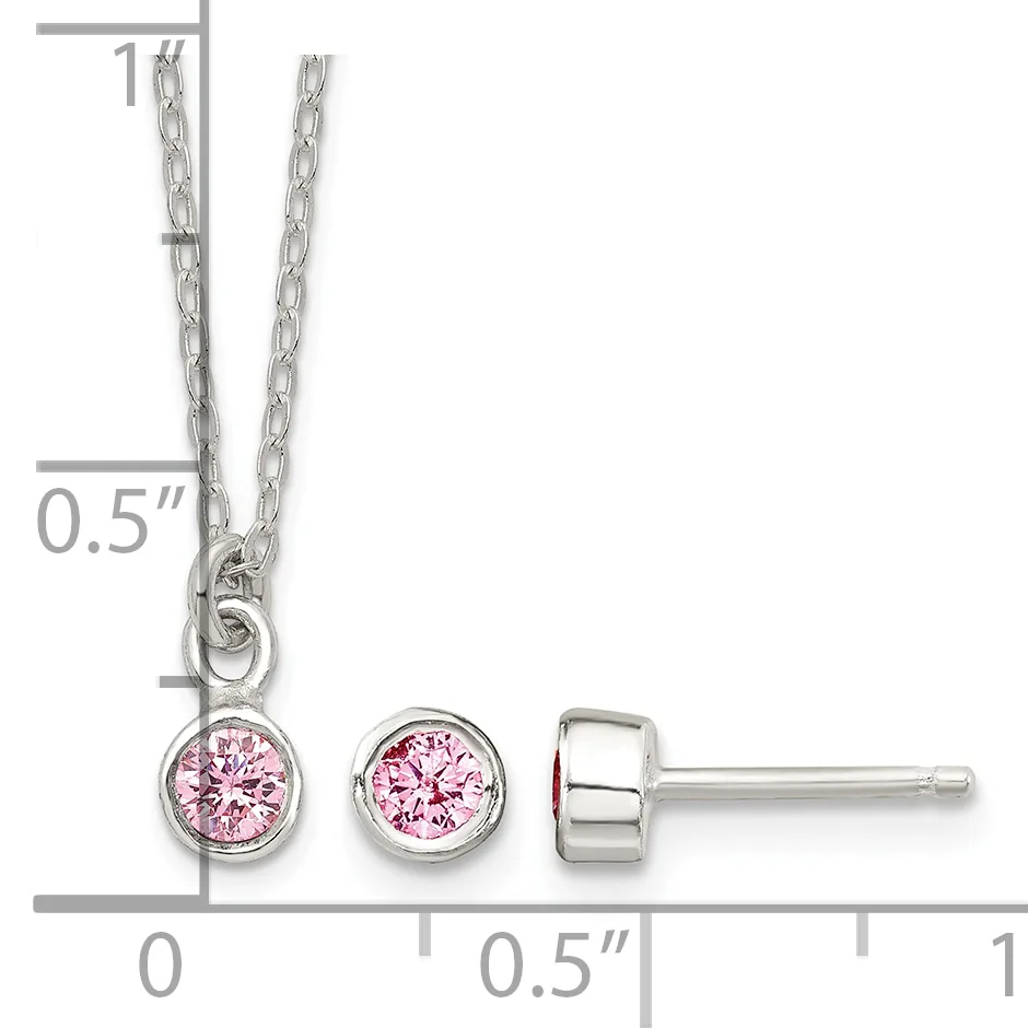 Silver necklace with a round pink cubic zirconia pendant and matching round pink cubic zirconia stud earrings displayed with measurement scale.