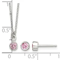 Silver necklace with a round pink cubic zirconia pendant and matching round pink cubic zirconia stud earrings displayed with measurement scale.