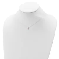 A silver necklace with a small round pendant featuring a pink stone displayed on a white mannequin bust.