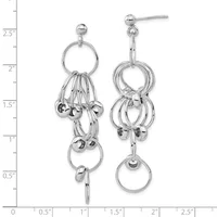 Silver dangle earrings featuring stacked rings and small spheres suspended from ball post studs, displayed on a measurement scale showing approximately 2.75 inches in length.
