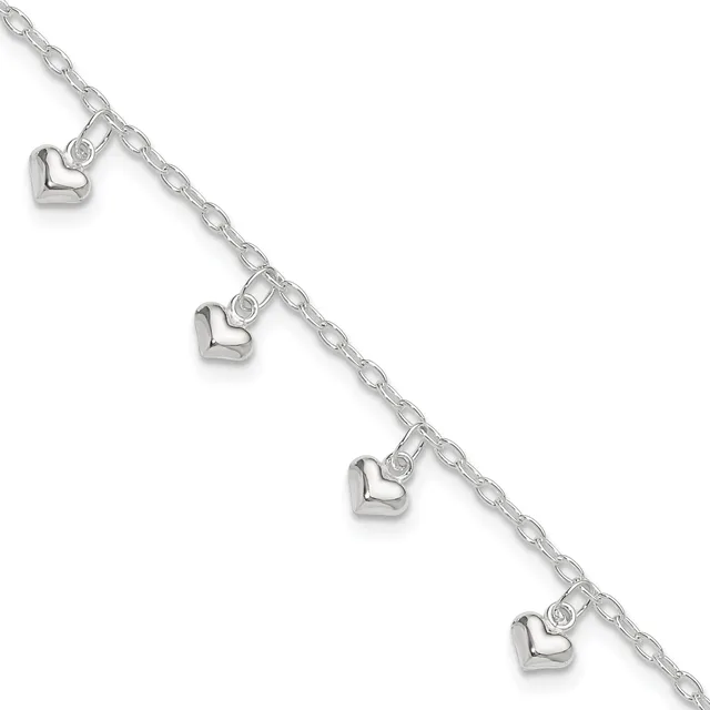 Silver chain bracelet with four small heart charms evenly spaced along its length, displayed diagonally against a white background.