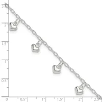 Silver chain bracelet with four small heart charms evenly spaced along its length, displayed against a ruler showing measurements in inches.