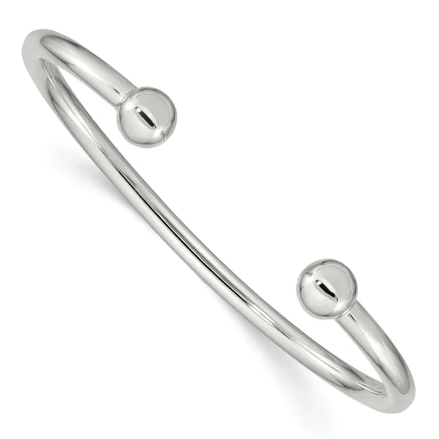 Silver-toned metal cuff bracelet with polished finish and two spherical end caps, each featuring a small slot detail.