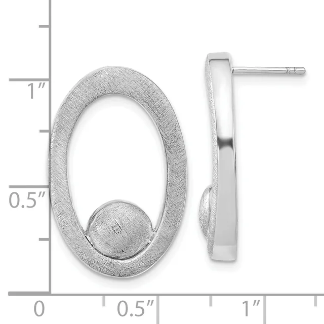 A pair of textured silver oval hoop earrings with small ball accents, shown front and side view with a measurement scale indicating approximately one inch in height.