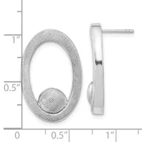A pair of textured silver oval hoop earrings with small ball accents, shown front and side view with a measurement scale indicating approximately one inch in height.