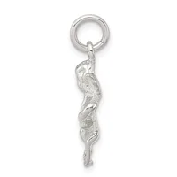 A silver keychain charm depicting a stylized female figure in an elegant twisted pose, suspended from a split ring.