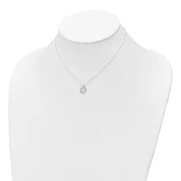 A silver pendant necklace with a small circular charm hanging from a delicate chain, displayed on a white mannequin bust.