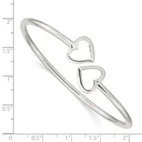 Silver-toned bangle bracelet with two open heart charms, shown against a measurement scale indicating approximately two inches in length.