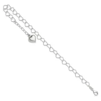 Silver-toned bracelet with heart-shaped links throughout the chain and a solid heart charm pendant hanging from the center.