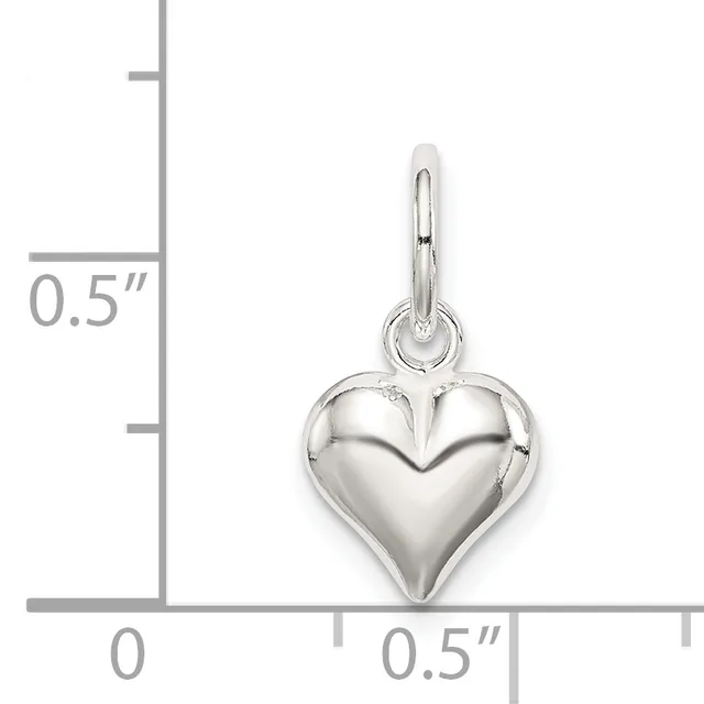 Sterling silver puffed heart charm with bail, shown next to a ruler indicating the charm is approximately 0.5 inches wide and 0.5 inches tall.