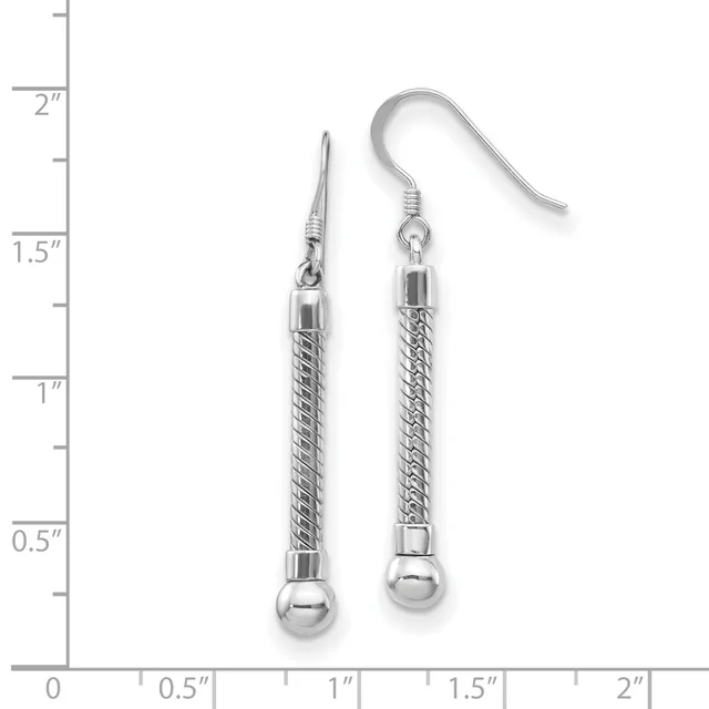 A pair of silver-toned dangle earrings with twisted cylindrical bodies and small spheres at the bottom, displayed against a measurement ruler showing they are approximately 1.5 inches long.