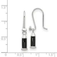 A pair of silver-toned earrings with black cylindrical onyx or stone drops, displayed next to a measurement ruler showing they are approximately one inch in length.