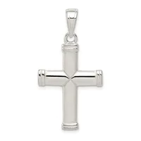 A polished silver cross pendant with cylindrical terminals at each end and a small loop bail at the top, shown against a white background.