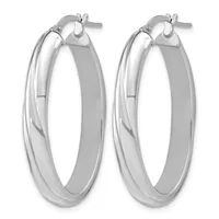A pair of polished silver hoop earrings with a chunky, rounded profile and post-and-clutch closures, shown against a white background.