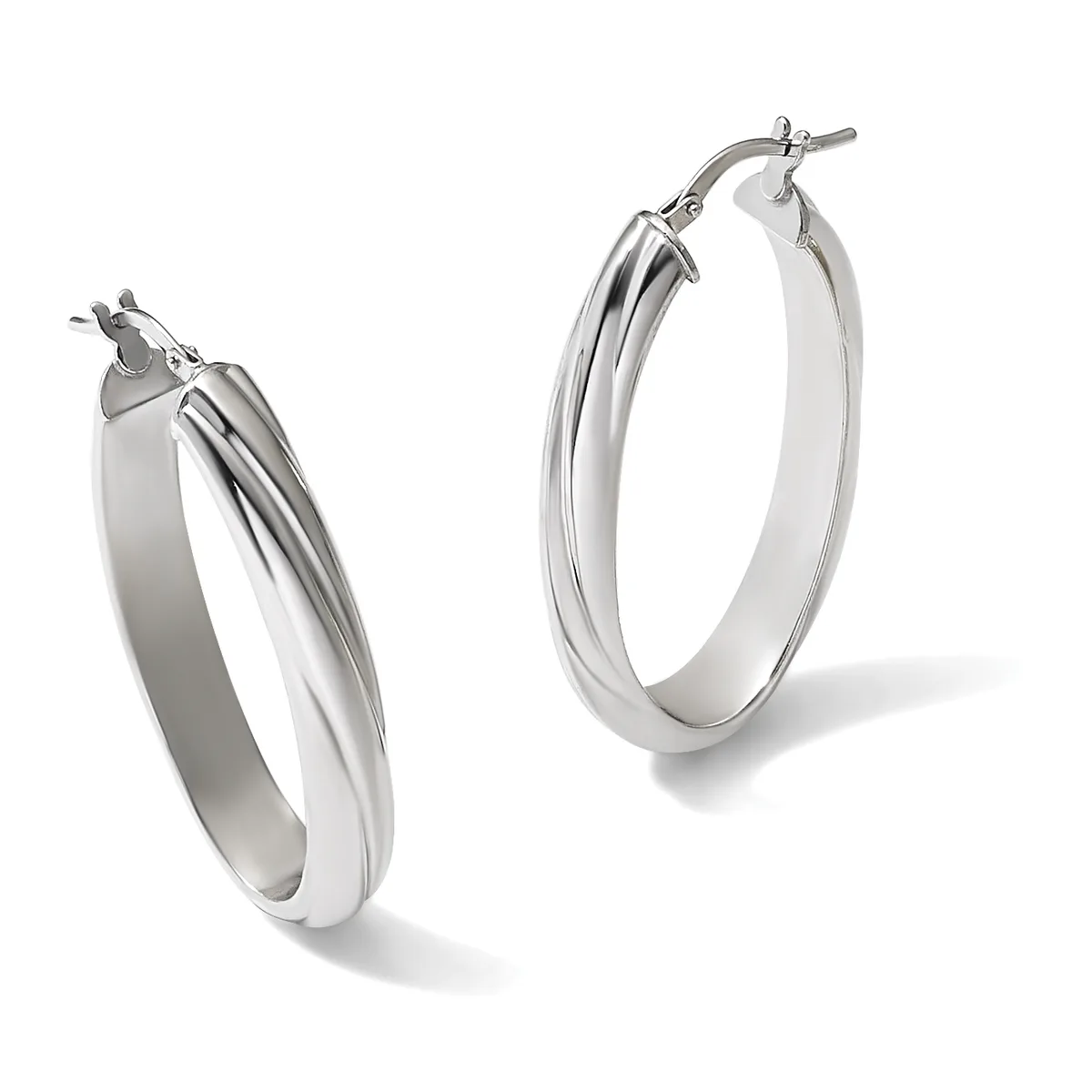 A pair of polished silver hoop earrings with a grooved center detail, shown from slightly different angles against a white background.
