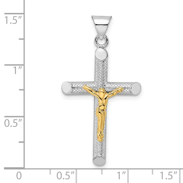 A two-tone cross pendant with a textured silver finish and gold-plated corpus figure, shown against a measurement scale indicating approximately 1.3 inches in height.