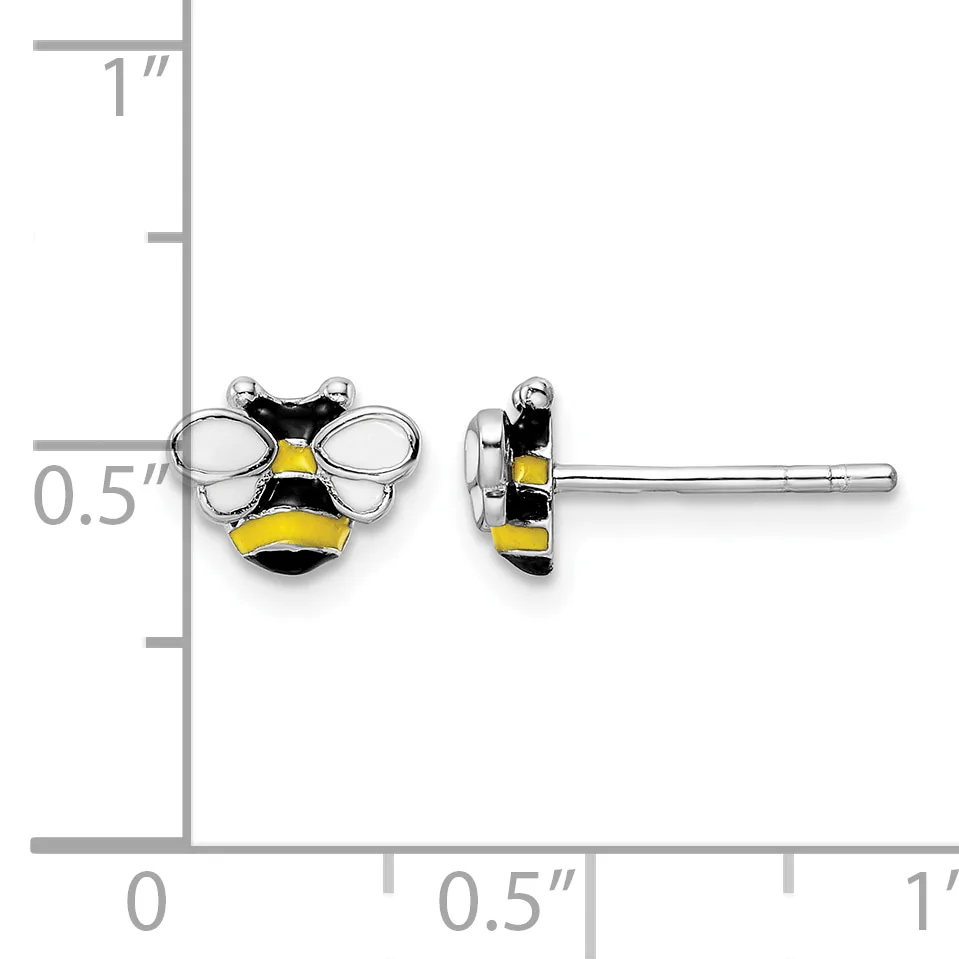 Two bee-shaped stud earrings with black and yellow enamel stripes and white enamel wings on silver posts, shown front and side view against a measurement scale.
