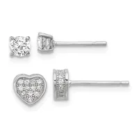 Two pairs of diamond stud earrings in white metal: the top pair features single round brilliant diamonds in four-prong settings, and the bottom pair shows heart-shaped settings filled with clustered round diamonds.