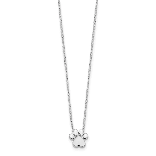 Silver paw print pendant hanging from a delicate chain necklace against a white background.
