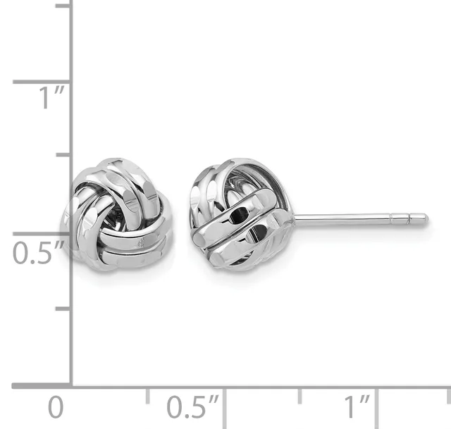 Pair of polished silver twisted knot stud earrings shown next to a ruler measuring approximately 0.5 inches in diameter.