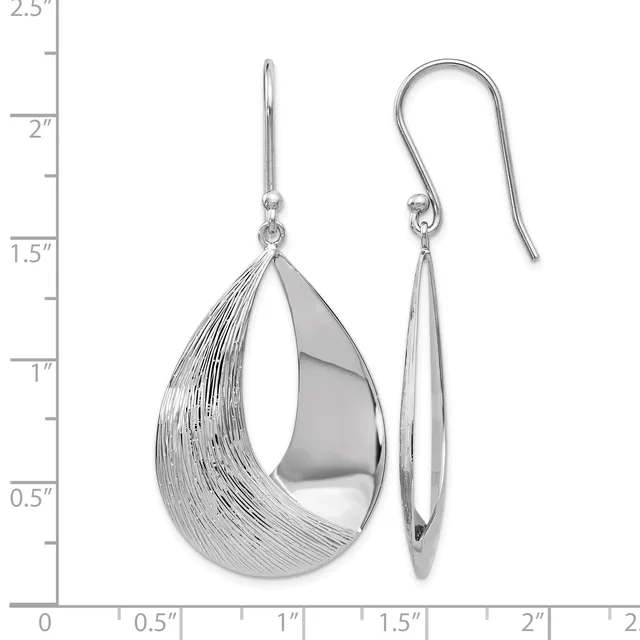 A pair of silver teardrop earrings with textured and polished finishes, displayed against a measurement scale showing they are approximately 1.25 inches long.