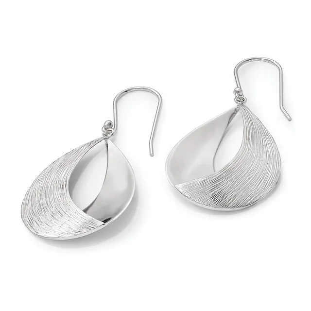 A pair of silver teardrop-shaped earrings with textured surfaces and polished concave interiors, suspended from curved ear wires.