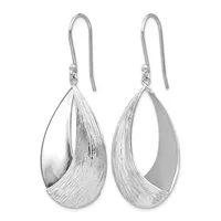 Pair of silver teardrop earrings with textured and polished surfaces, suspended from curved wire hooks.
