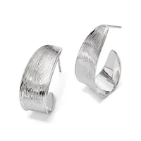 A pair of silver hoop earrings with a brushed textured finish and post backs, shown from two angles against a white background.