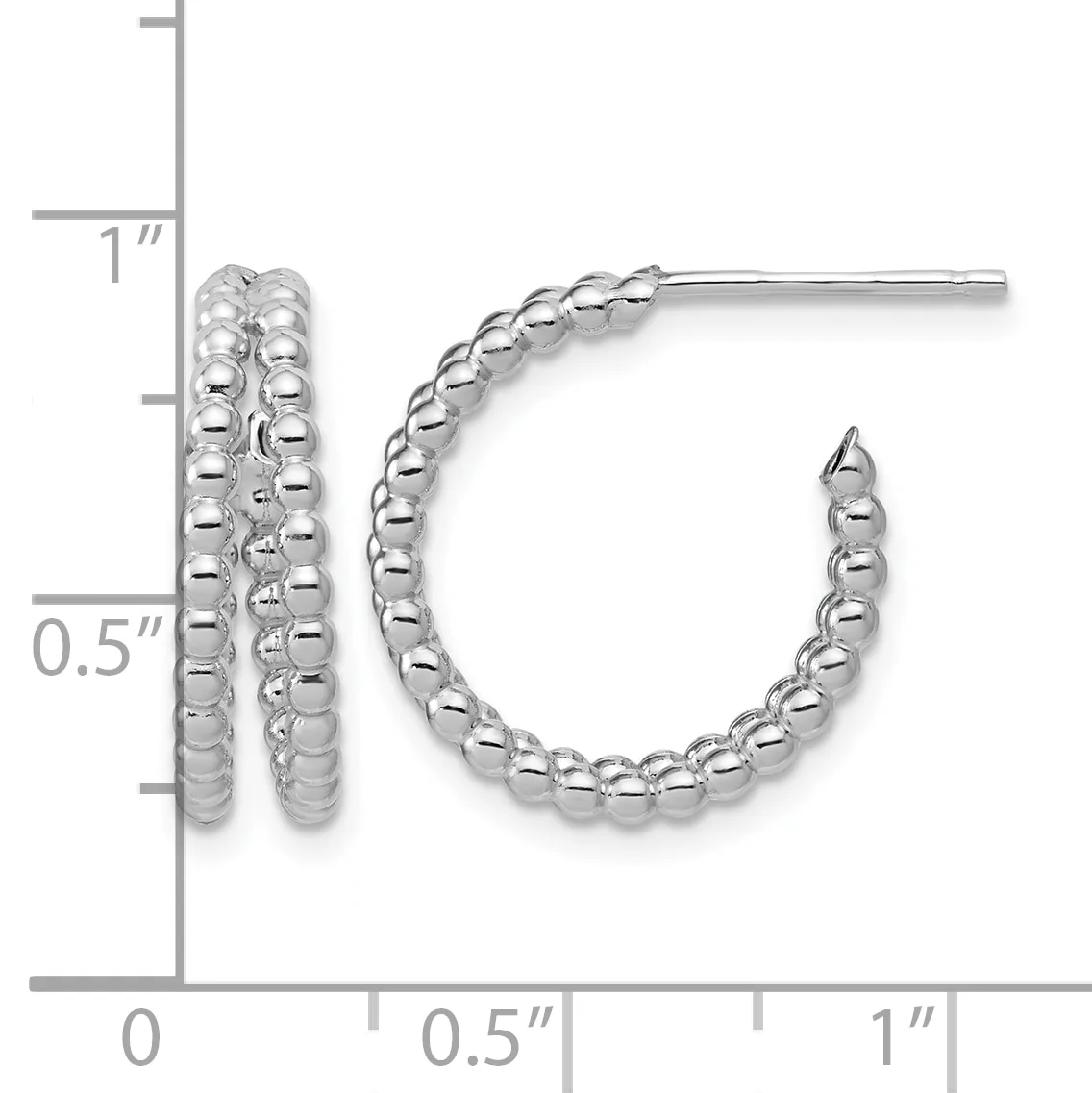 Pair of silver textured hoop earrings with beaded surface design, shown next to a ruler indicating approximately one inch in length.