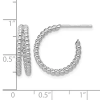 Pair of silver textured hoop earrings with beaded surface design, shown next to a ruler indicating approximately one inch in length.