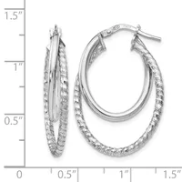A pair of oval hoop earrings with textured surfaces, shown next to a measurement scale indicating approximately one inch in height.