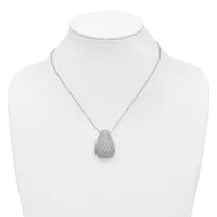 Silver teardrop-shaped pendant necklace with pave-set stones displayed on a white bust form.