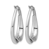 A pair of polished silver-toned oval hoop earrings with a chunky, curved design and post closures.