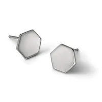 A pair of silver hexagonal stud earrings with polished domed faces and posts, displayed against a white background.