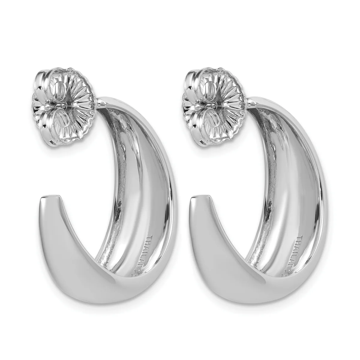A pair of polished silver hoop earrings with textured flower-shaped post backs, displayed against a white background.